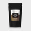 Naturlea Indulged Coconut Coffee Scrub 500g Pouch on Grey Background. Your time to rejuvenate. 100% Australian Made.