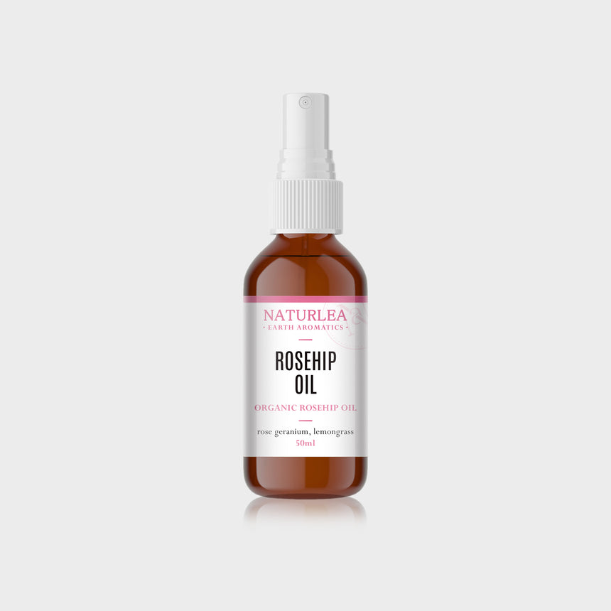 Naturlea Rosehip Oil 50mL bottle on grey background. Ultra nourishing for skin that is stressed and dehydrated.